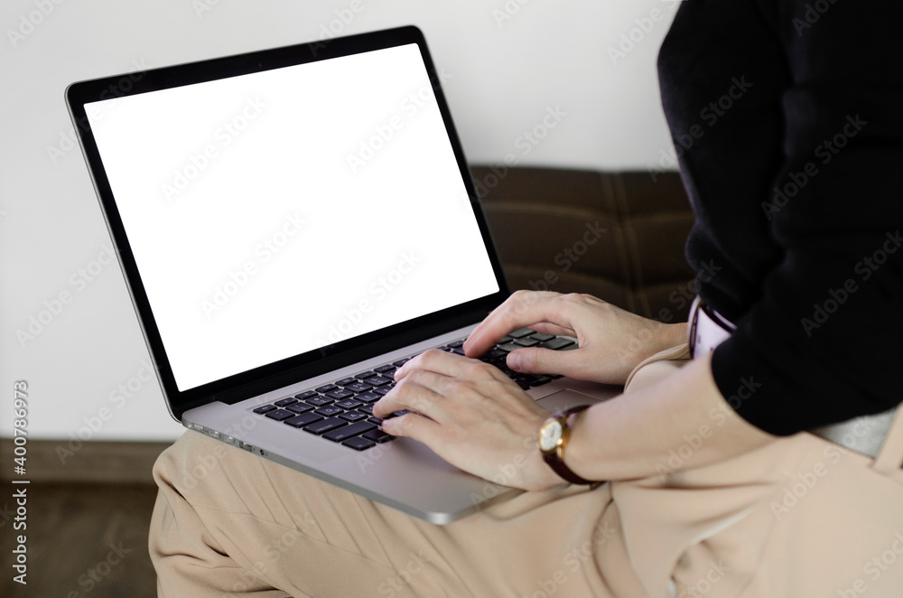 Woman taps on her laptop. Business mock-up