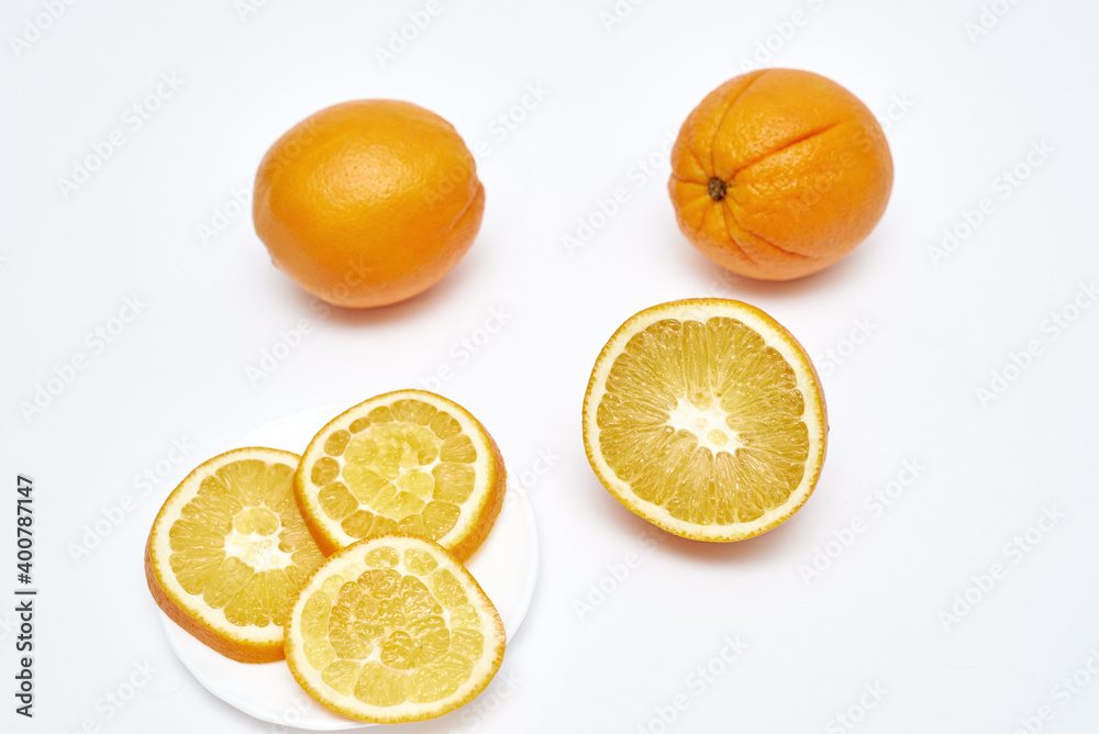 ripe oranges on a white background