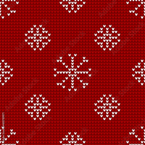 Seamless knitting pattern with snowflakes is on the red background. Save with the Clipping Mask.