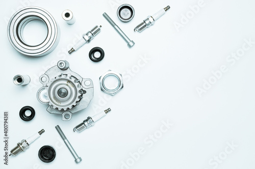 Auto mechanic. Set of new metal car part. Auto motor mechanic spare or automotive piece isolated on white background. Automobile engine service with space for text.