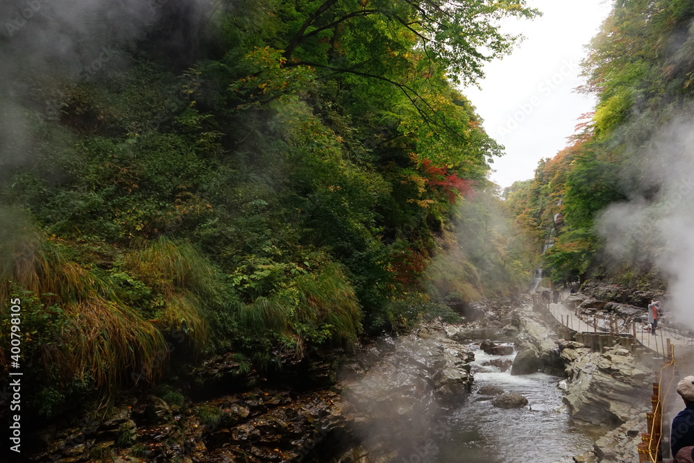 Misty autumn mountain view of Oyasukyo Gorge with Minase River in Akita prefecture, Japan - 小安峡 皆瀬川 秋田県 湯沢市 日本 Misty autumn mountain view of Oyasukyo Gorge with Minase River in Akita prefecture, Japan - 小安峡 皆瀬川 秋田県 湯沢市 日本