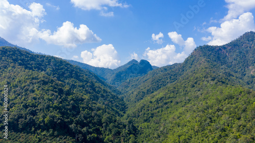Fototapeta Naklejka Na Ścianę i Meble -  landscape aerial view mountain range and agricultural tangerine farmland in valley at chiangmai Thailand