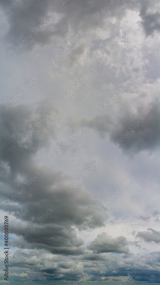 Obraz premium Fantastic thunderclouds, vertical panorama
