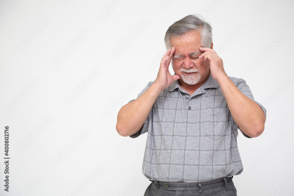 Asian senior man with headache isolated on white background, Health problem and feeling sick concept Asian senior man with headache isolated on white background, Health problem and feeling sick concept