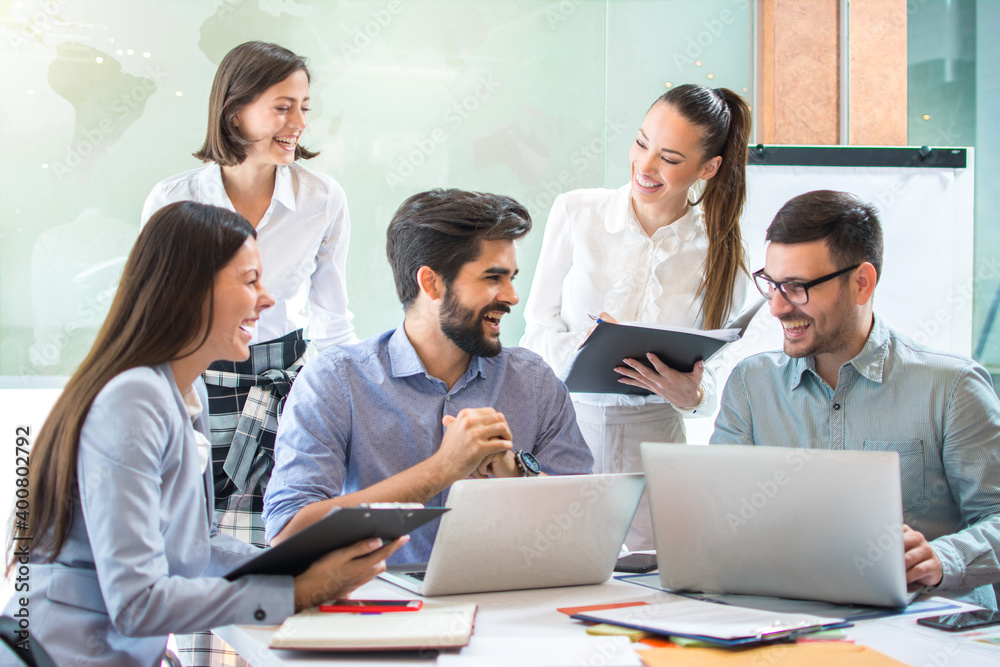 Group of confidence business people working together in the office.