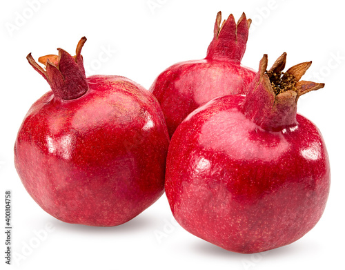 three pomegranate fruits isolated on a white background. clipping path