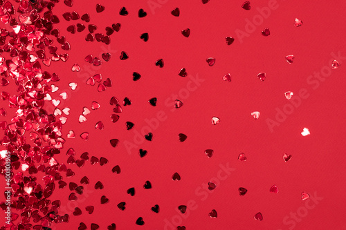 Red hearts on a red background. Valentine's day, love relationship. Festive concept