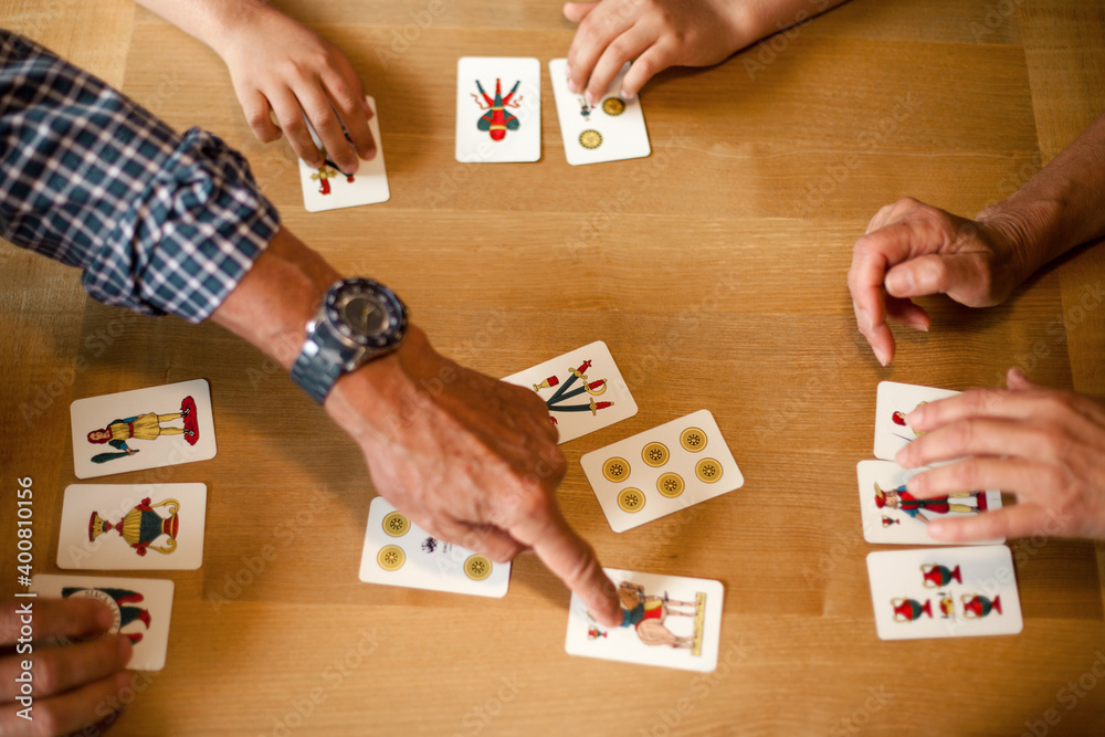 Obraz premium Top view of a wooden table with cards.