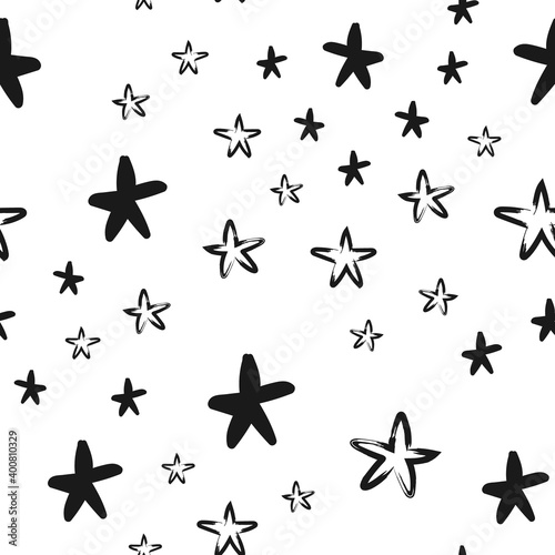 Hand drawn stars seamless texture pattern. Star doodles.
