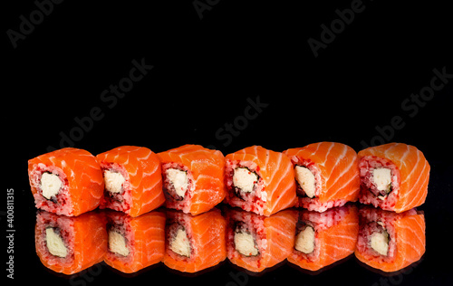 sushi with fish and vegetable ingredients
