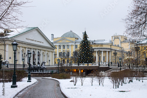 view of Manezhnaya square and decorated Christmas tree on a cloudy winter day in Moscow Russia