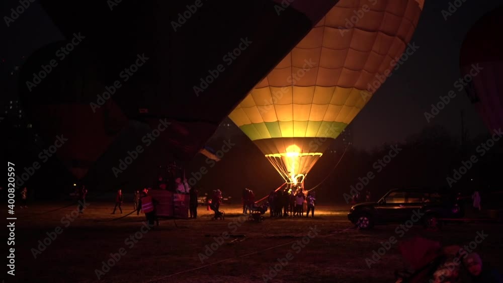Hot air balloon festival, Night light show Ukraine, slow motion. Kiev December 18, 2020 