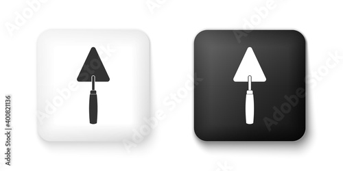 Black and white Trowel icon isolated on white background. Square button. Vector.