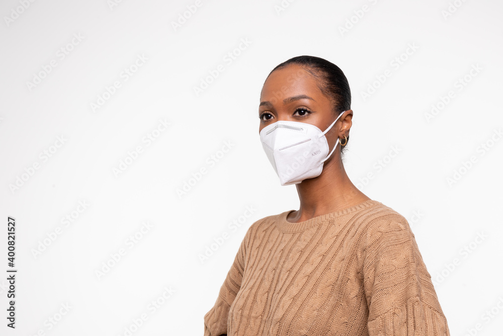 African-American woman wearing KN95 mask to keep her protect from viruses 369 African-American woman wearing KN95 mask to keep her protect from viruses 369