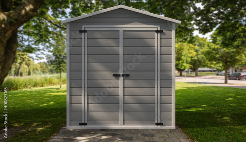 Gardening tools storage shed in the house backyard on green trees background. 3d illustration