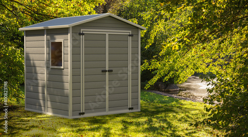 Gardening tools storage shed in the house backyard on green trees background. 3d illustration photo