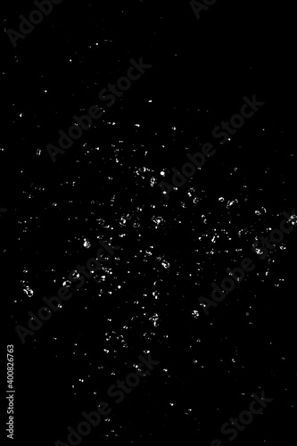 Drops of water, sparkling, on black background 