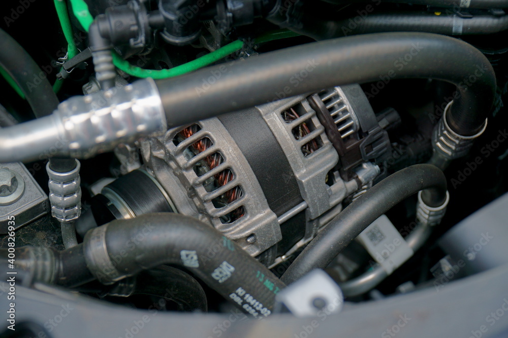 Alternator in engine bay of a car Stock Photo Adobe Stock