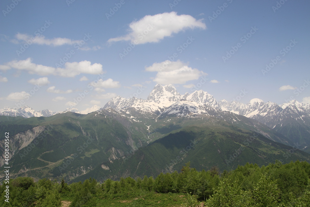 Snowy peaks of the mountans with green valleys, Ushba in Svanetia