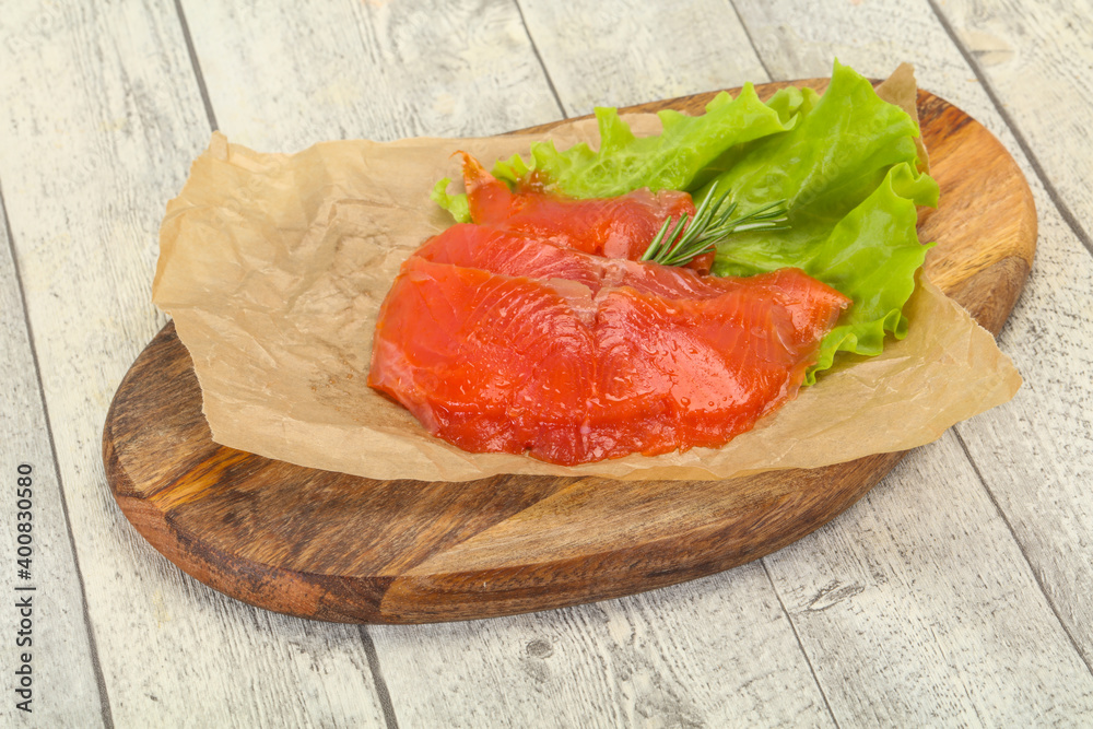 Sliced salmon fillet served rosemary Sliced salmon fillet served rosemary