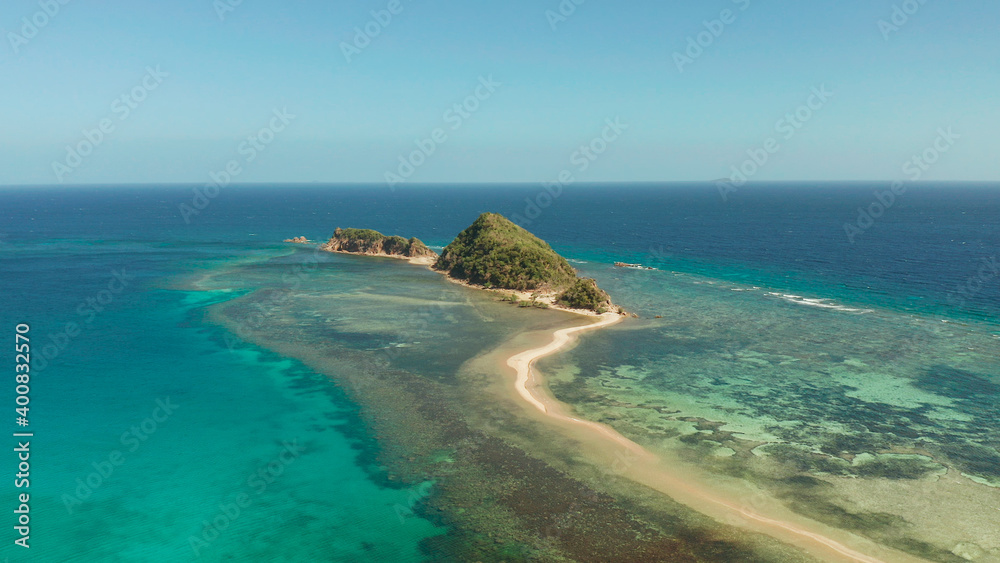 aerial view tropical island in blue lagoon, coral reef and sandy beach. Palawan, Philippines. tropical landscape with island and beache travel concept
