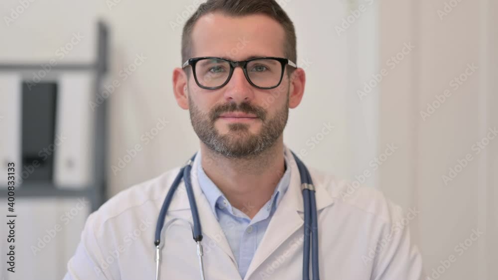 Portrait of Male Doctor Looking at the Camera Portrait of Male Doctor Looking at the Camera