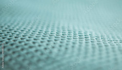 background blue knitted texture  close-up with blur	