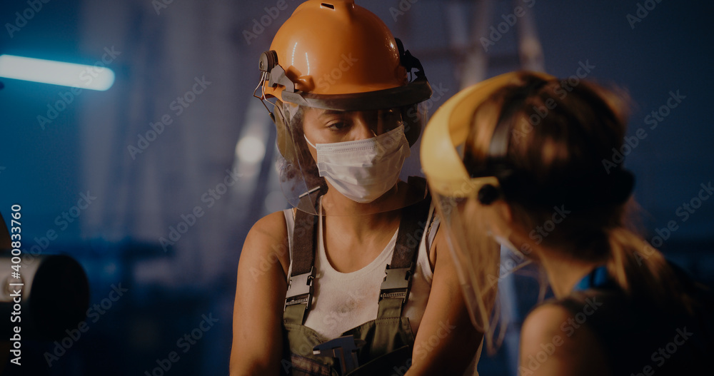 Professional female workers on industrial manufacture Professional female workers on industrial manufacture