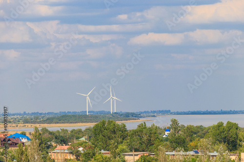 Wind turbines at Dzharylhach bay of the Black sea in Lazurne, Ukraine. Renewable energy photo