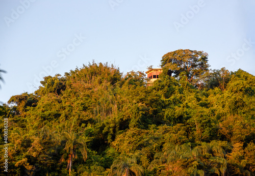 Old pentagonal lookout, on top of a small hill surrounded by tropical forest, at sunset, Rio de Janeiro, Brazil