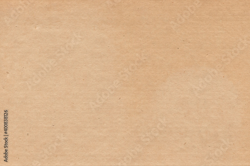 Vintage and old looking paper background. Retro cardboard texture. Grunge paper for drawing. Ancient book page.