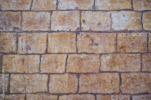 background stone pavement. road paved with cobbles. texture of bricks.