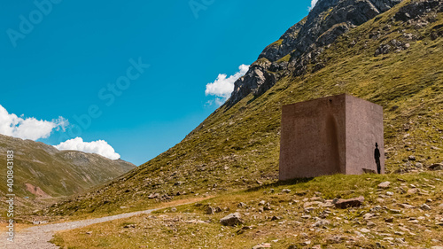 Beautiful alpine view with a smuggler memorial at the famous Timmelsjoch high alpine road, Hochgurgl, Oetztal, Tyrol, Austria photo