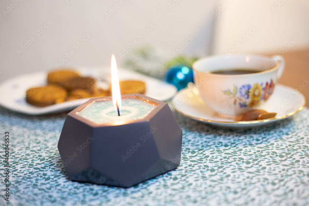 Burning candle on the table Burning candle on the table