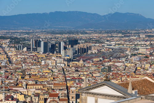 Italy, Campania, Naples, Aerial view of Spaccanapoli Quarter with skyscrapers in background photo