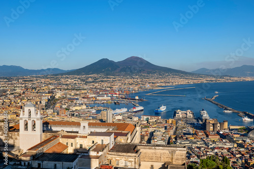 Italy, Campania, Naples, Certosa di San Martino museum and harbor in Gulf of Naples with Mount Vesuvius in background photo