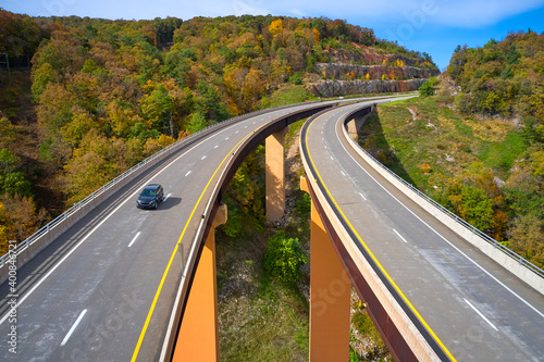 USA, West Virginia, Aerial view ofÔøΩU.S. Route 48 bridge stretching over Lost River inÔøΩAppalachian Mountains photo