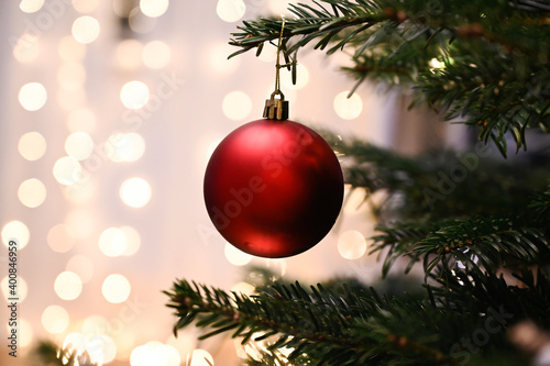 Christmas toys on the Christmas tree   close up. Holidays concept. Merry Christmas