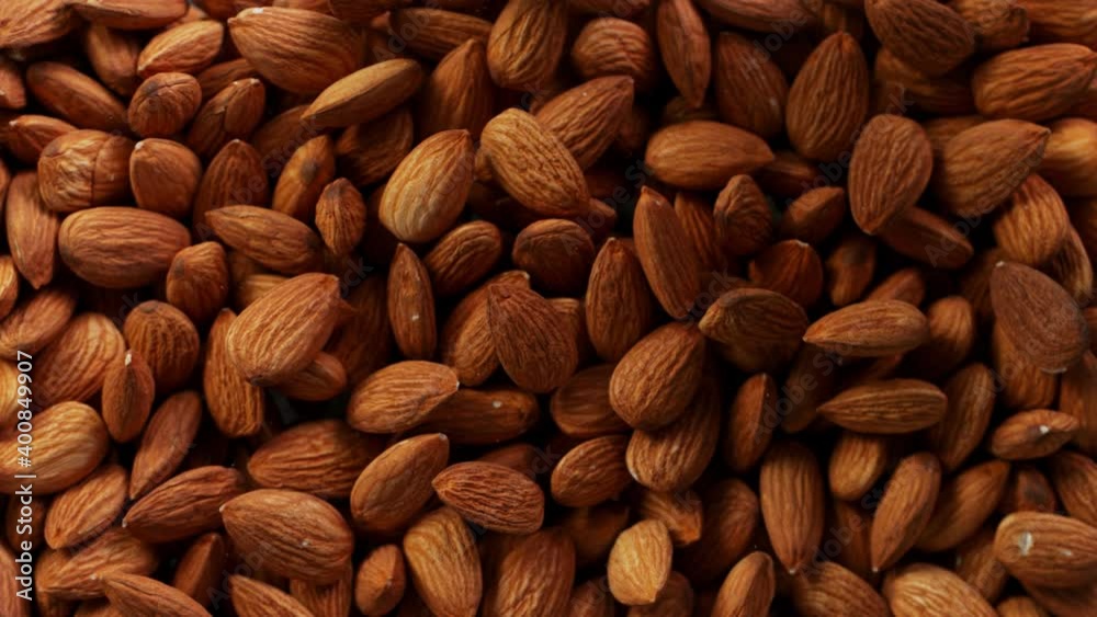 Super Slow Motion Shot of Almonds Background at 1000 fps. Super Slow Motion Shot of Almonds Background at 1000 fps.