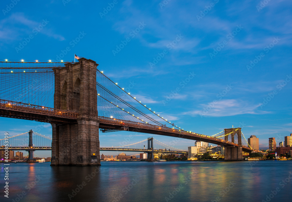 Brooklyn Bridge with skyscrapers background. New York.