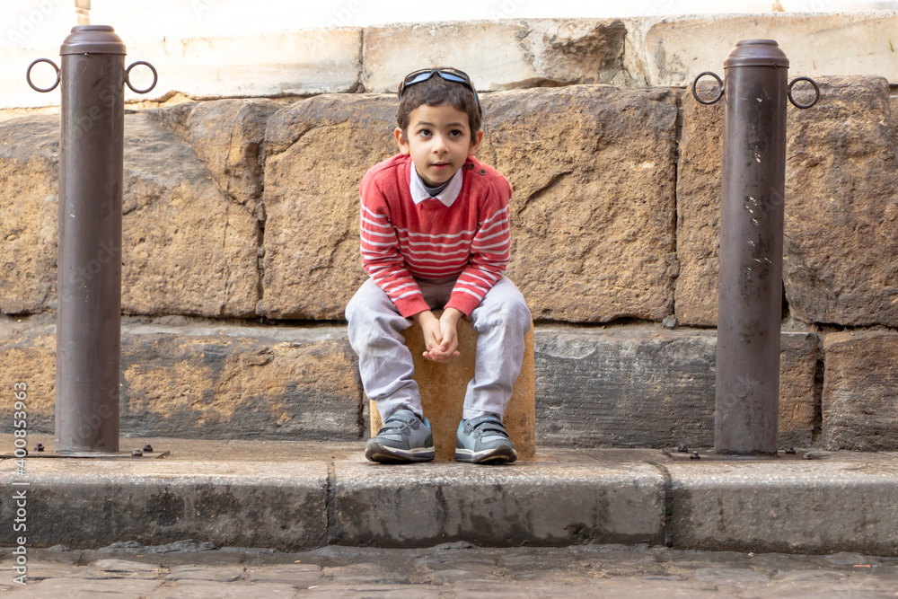 cute kid in el Meiz street, Cairo, Egypt cute kid in el Meiz street, Cairo, Egypt
