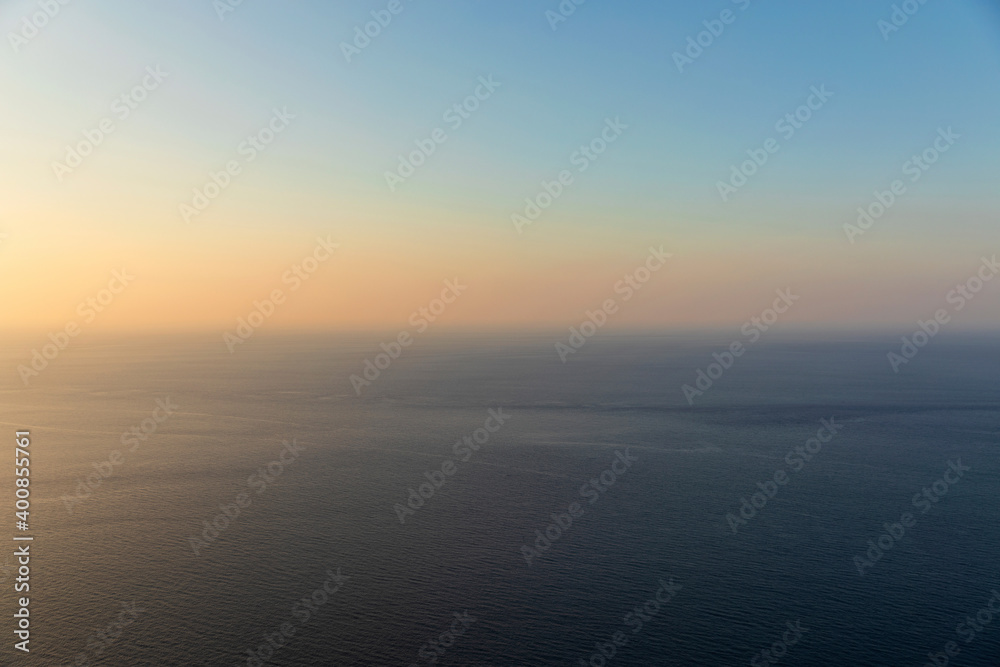 Mediterranean Sea at dusk with clear line of horizon in background Mediterranean Sea at dusk with clear line of horizon in background