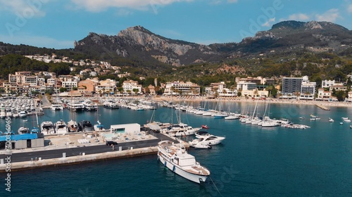 Marina and beach at bay seaside of Port de Soller on Mallorca, panoramic aerial view. High quality photo