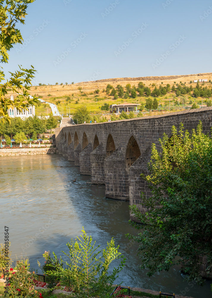 Diyarbakir, Turkey- September 17 2020: View of the Ten Eyed Bridge (On Gozlu Kopru in Turkish), historical bridge on Tigris River.