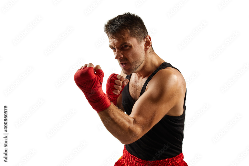 sporty man in red sports bandages on his hands fighting isolated on white background