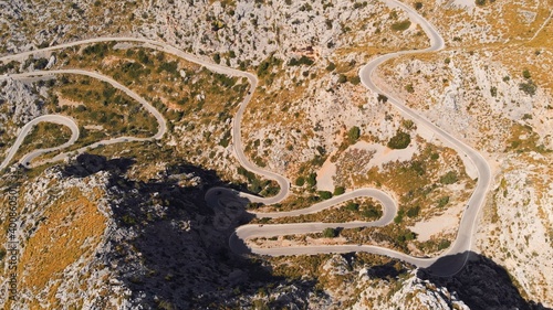 Mallorca, Serra De Tramuntana, mountain peeks and road The Knotted tie - nudo de corbata, World Heritage Site by UNESCO aerial. High quality photo photo