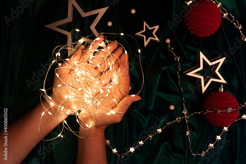 Flat lay christmas composition in trendy colors with sparks. Magic concept