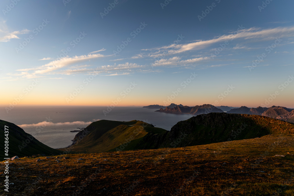 Landscape view of mountain against sky at Ryten, Lofoten, Norway Landscape view of mountain against sky at Ryten, Lofoten, Norway