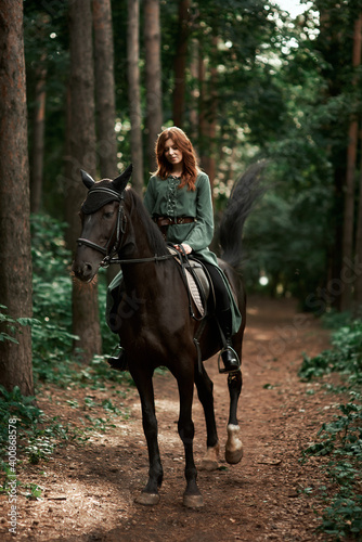 Gourmet lady in a vintage dress. A beautiful rider gently hugs the horse. Artistic Photography