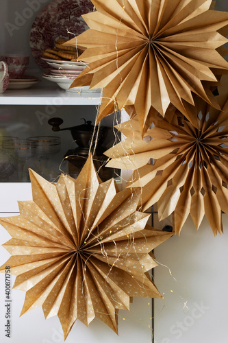 Obraz na płótnie Paper Christmas stars made from craft bags. w salonie
